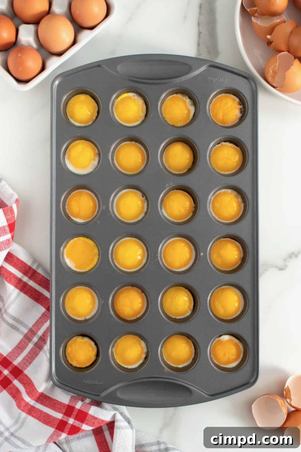 Bake Perfect Runny Eggs in Your Mini Muffin Pan 1 featured 26030