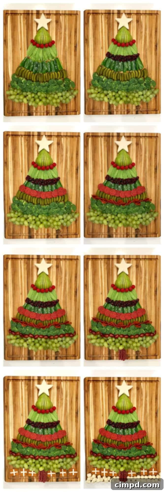 Holiday Tree of Treats 4 The Christmas tree snack board now fully adorned with red garnishes, including raspberries, crackers, and salami, creating a festive, garland-like appearance.