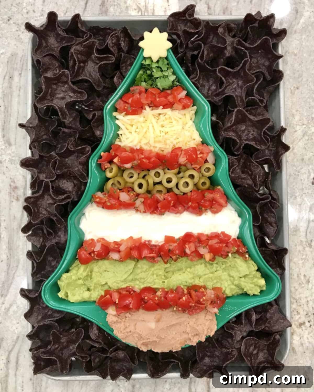 Christmas Tree 7 Layer Dip, a festive holiday appetizer from The BakerMama