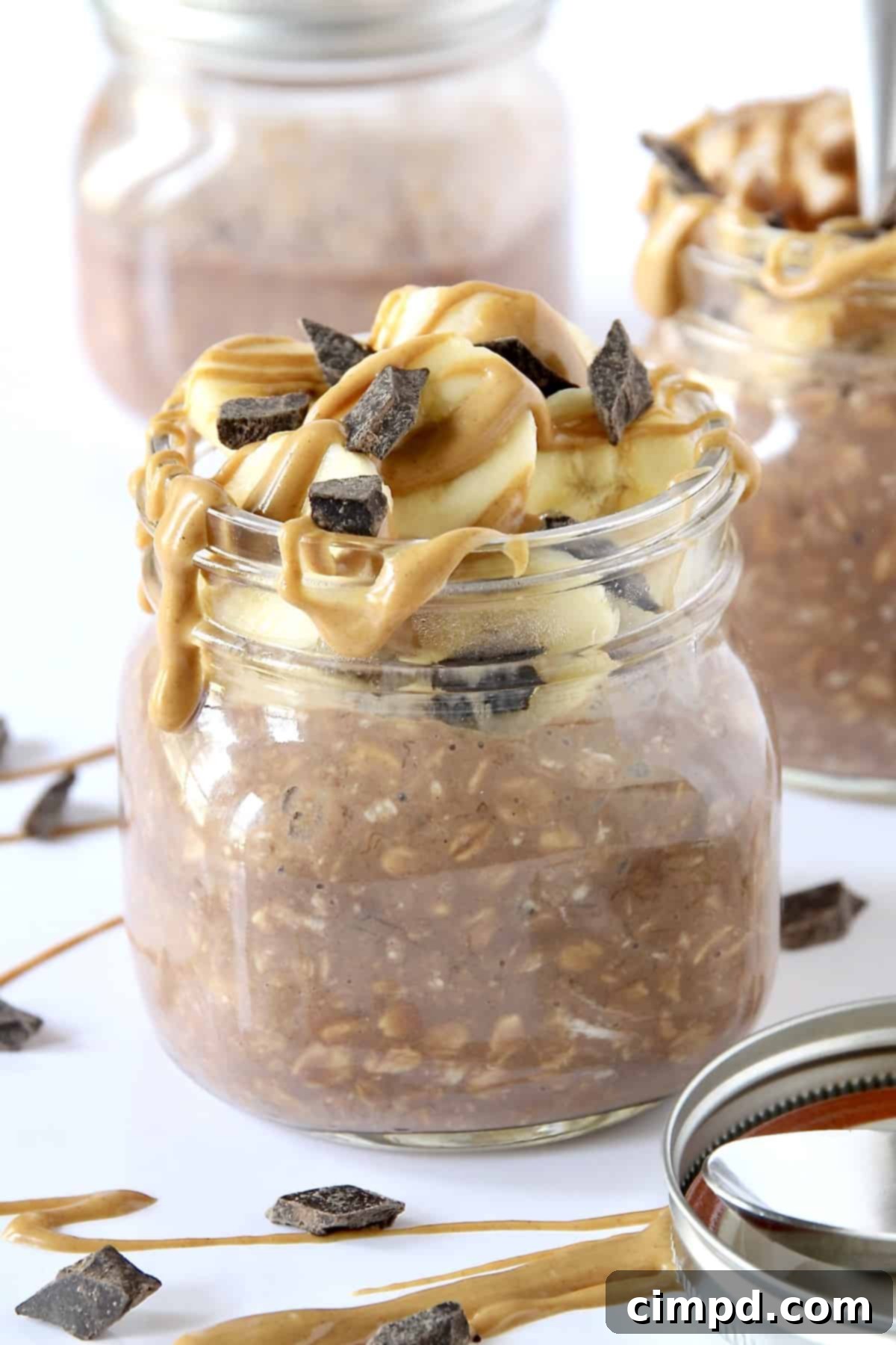 Power-Packed Chocolate Peanut Butter Banana Overnight Oats 2 Chocolate Peanut Butter Banana Protein Overnight Oats, beautifully layered in a jar