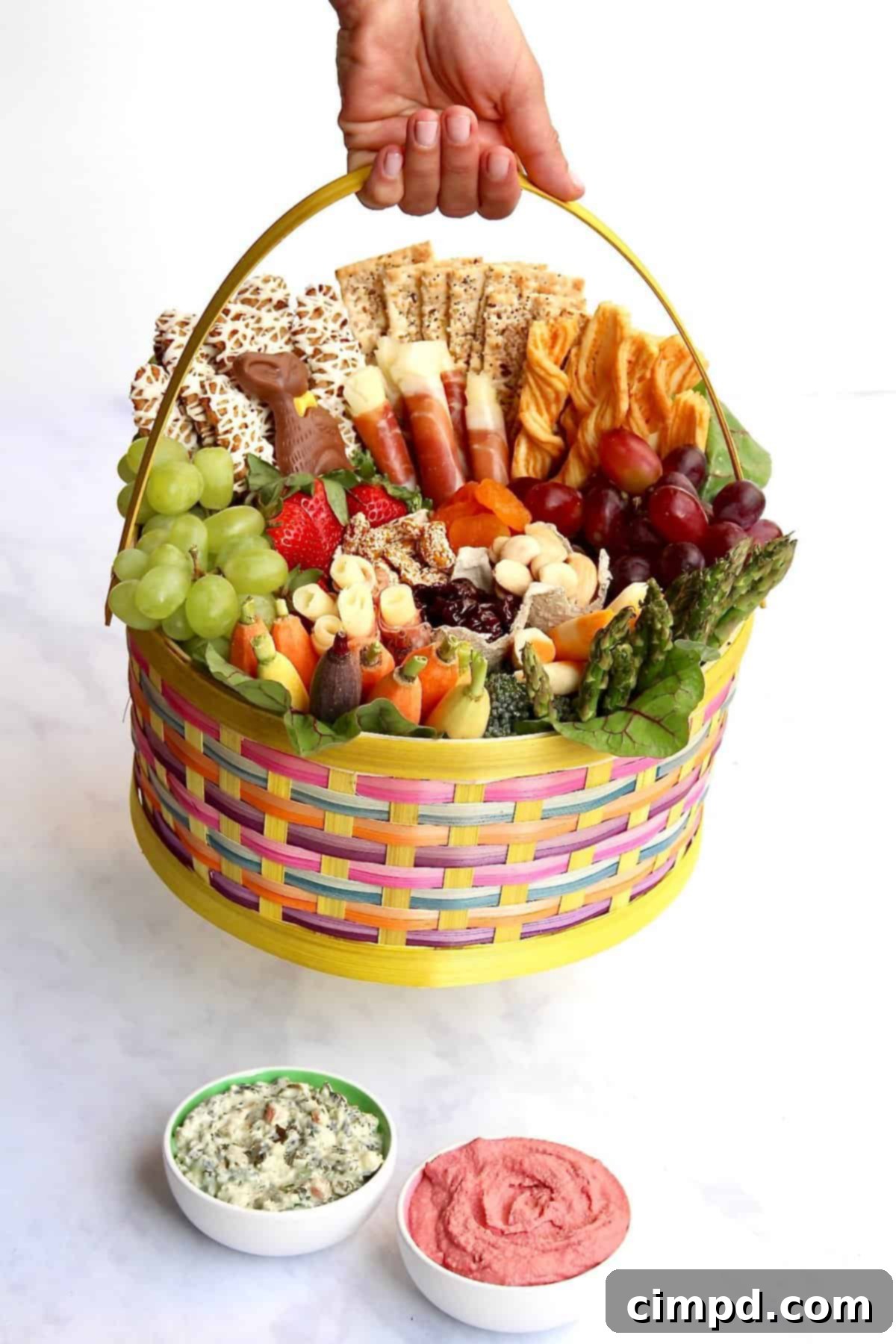 Close-up of the Easter Snack Basket showcasing fresh fruits and gourmet crackers
