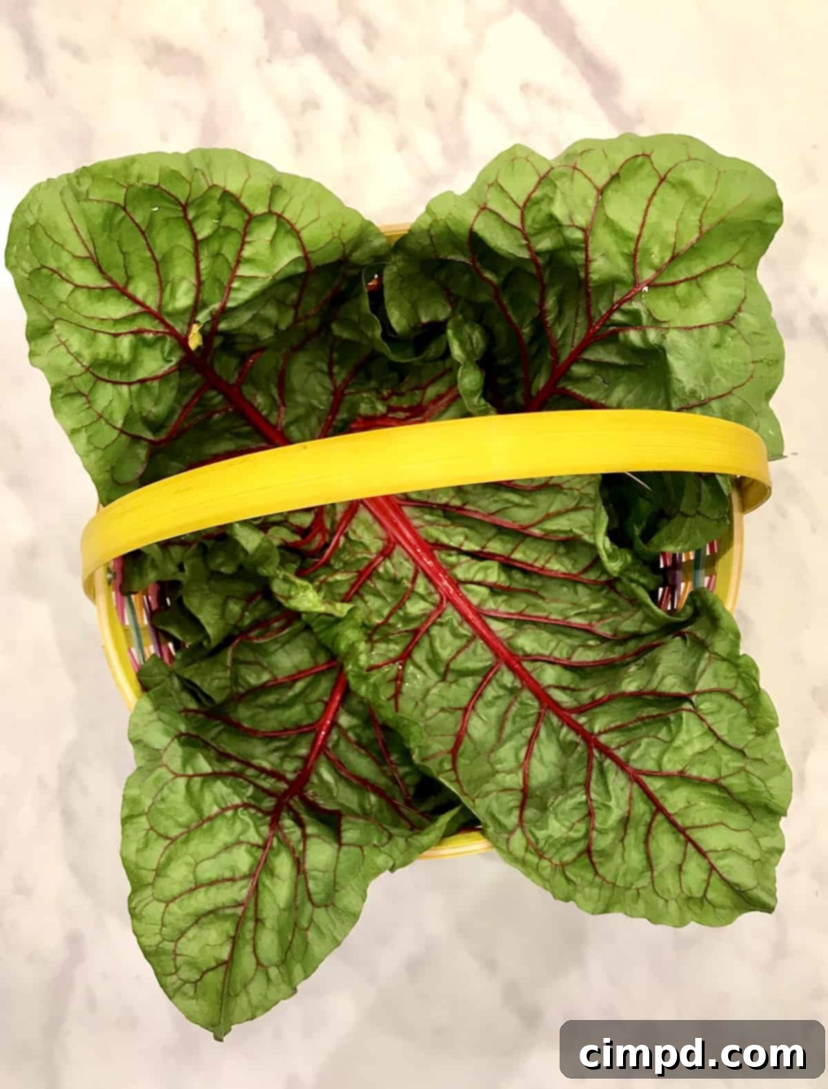 Arranging green grapes in the Easter Snack Basket