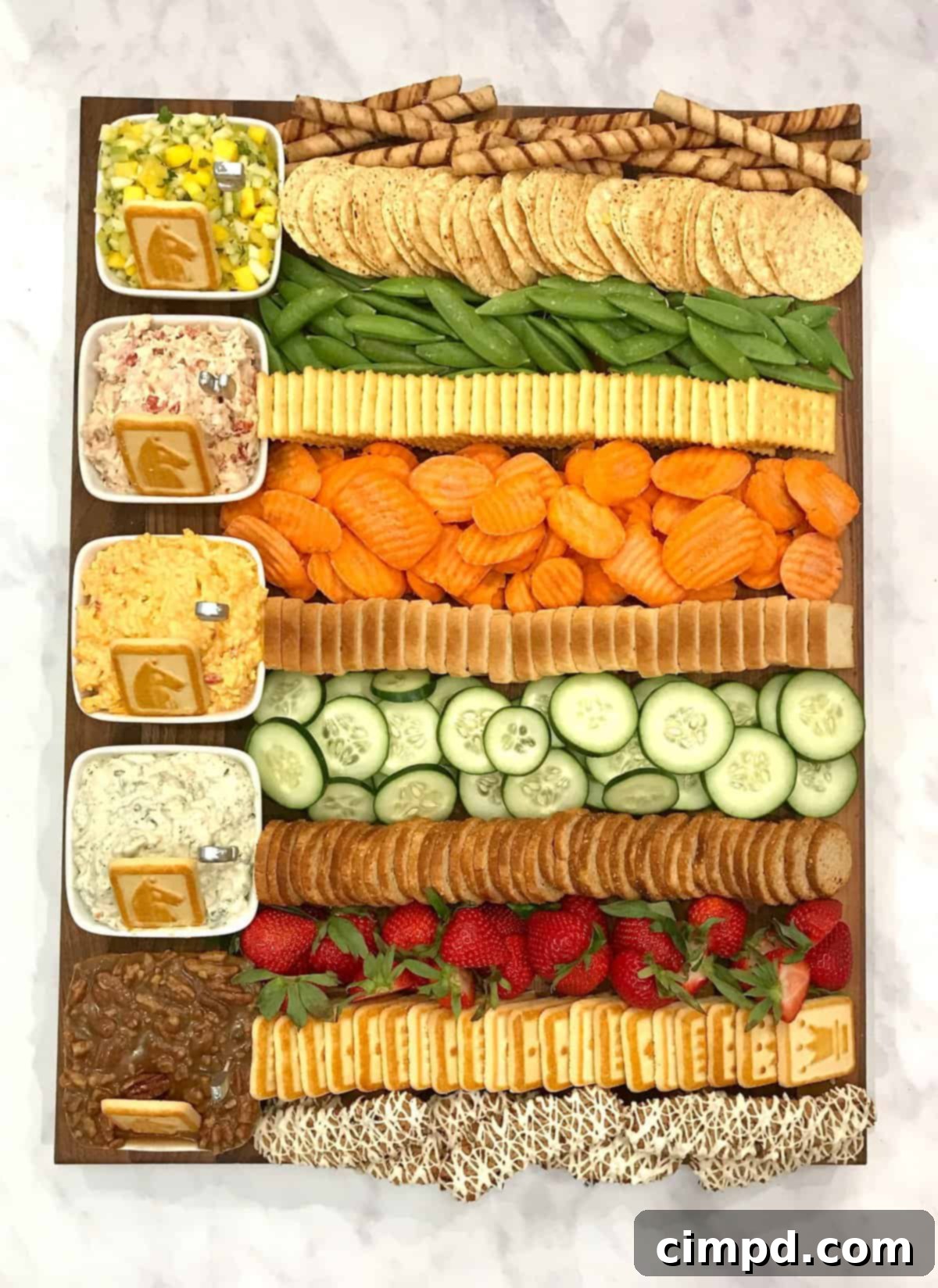 Festive Kentucky Derby Dip Board with various southern dips and dippers