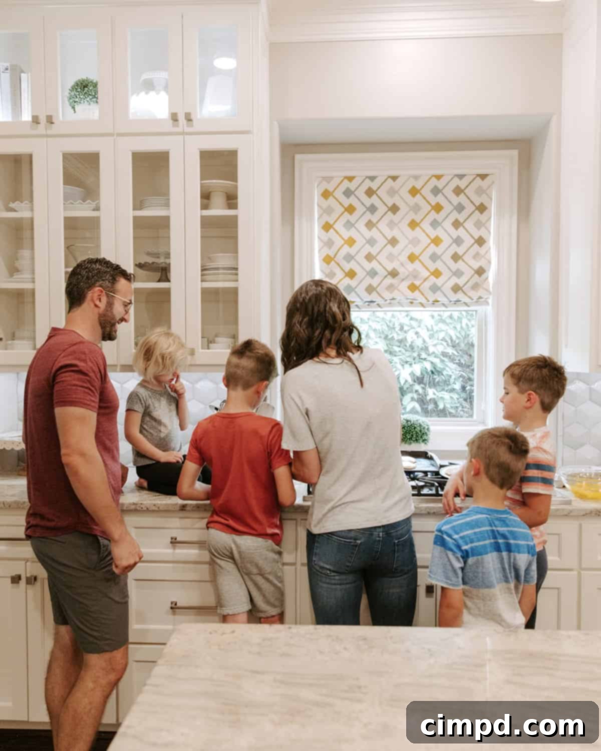 Children happily preparing Sunday breakfast together in the kitchen