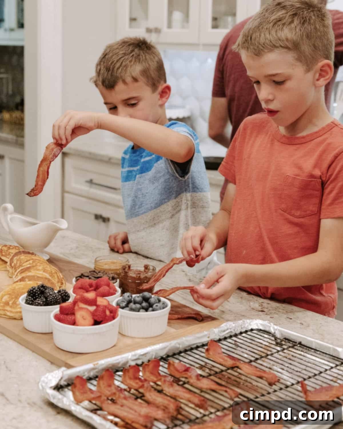 Family enjoying the breakfast board together at the dining table