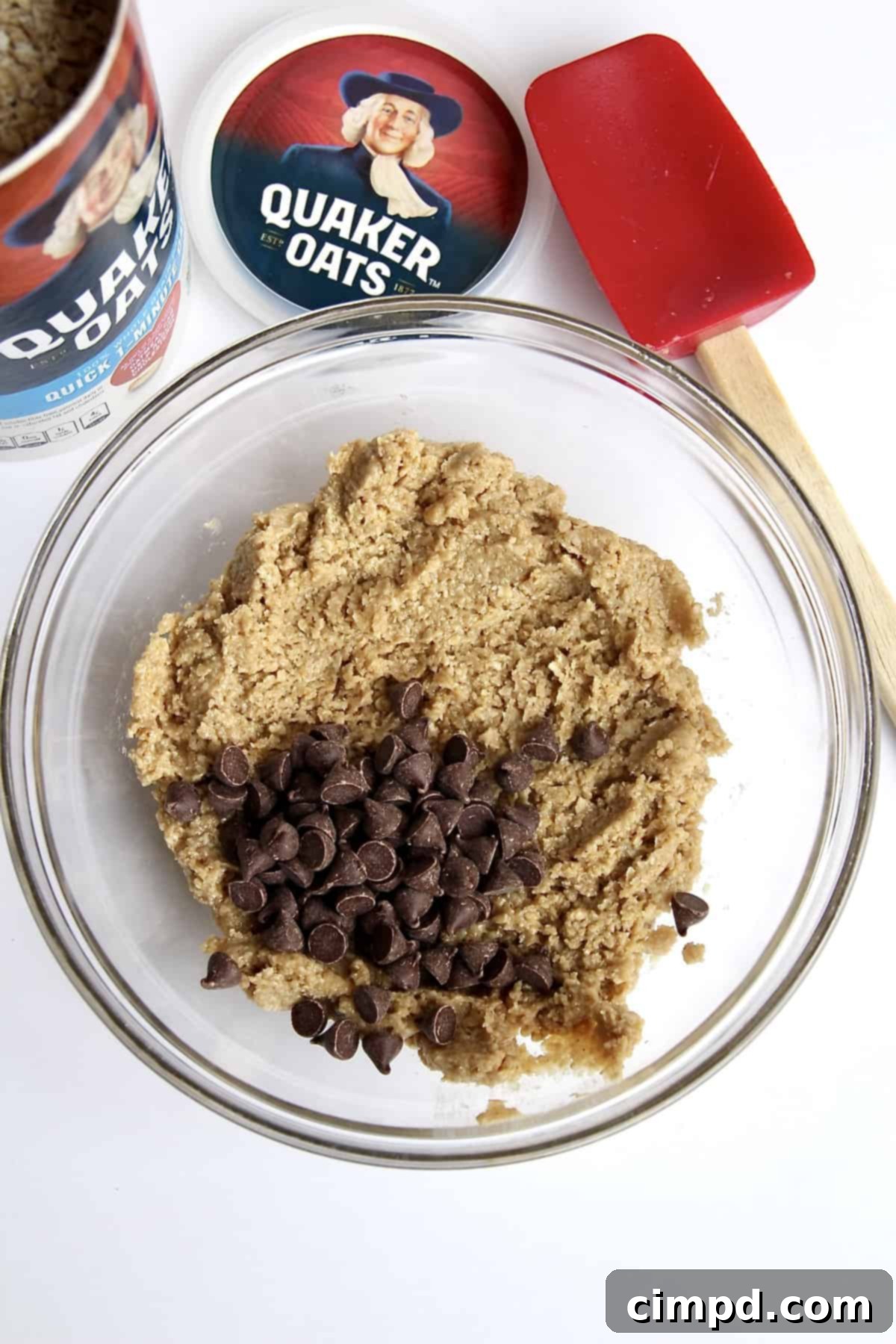 Adding chocolate chips to Healthy Edible Cookie Dough Bites