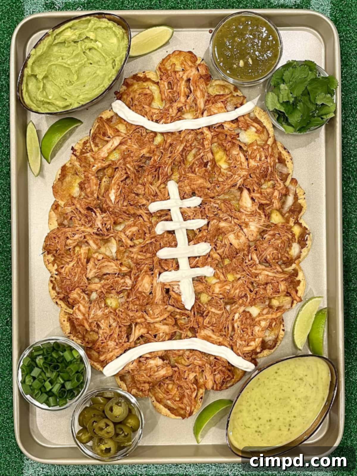 Game Day Nacho Platter 11 A sheet pan with football shaped nachos.