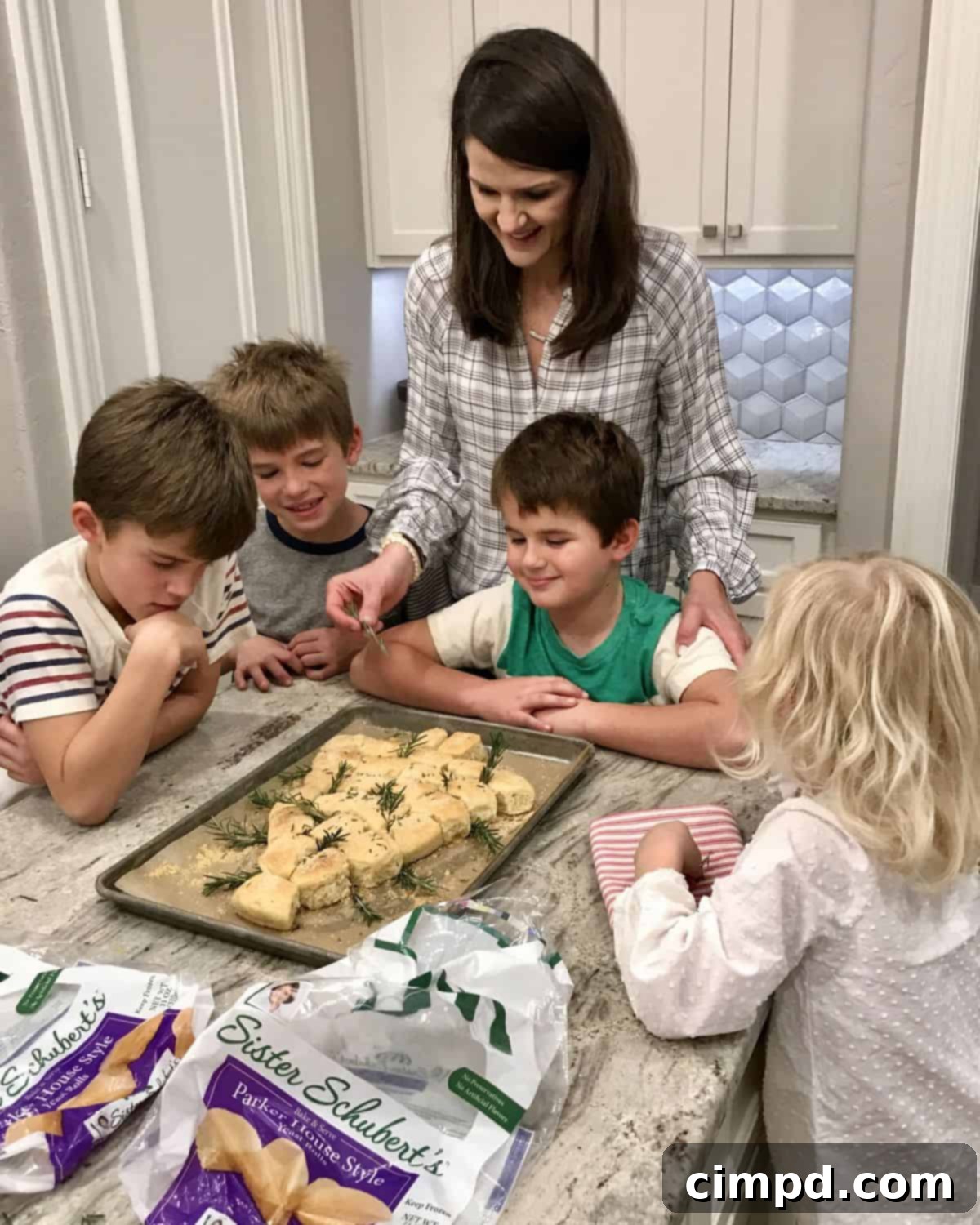 Yuletide Tree Dinner Rolls 3 Family enjoying Christmas Tree Dinner Rolls during the holidays