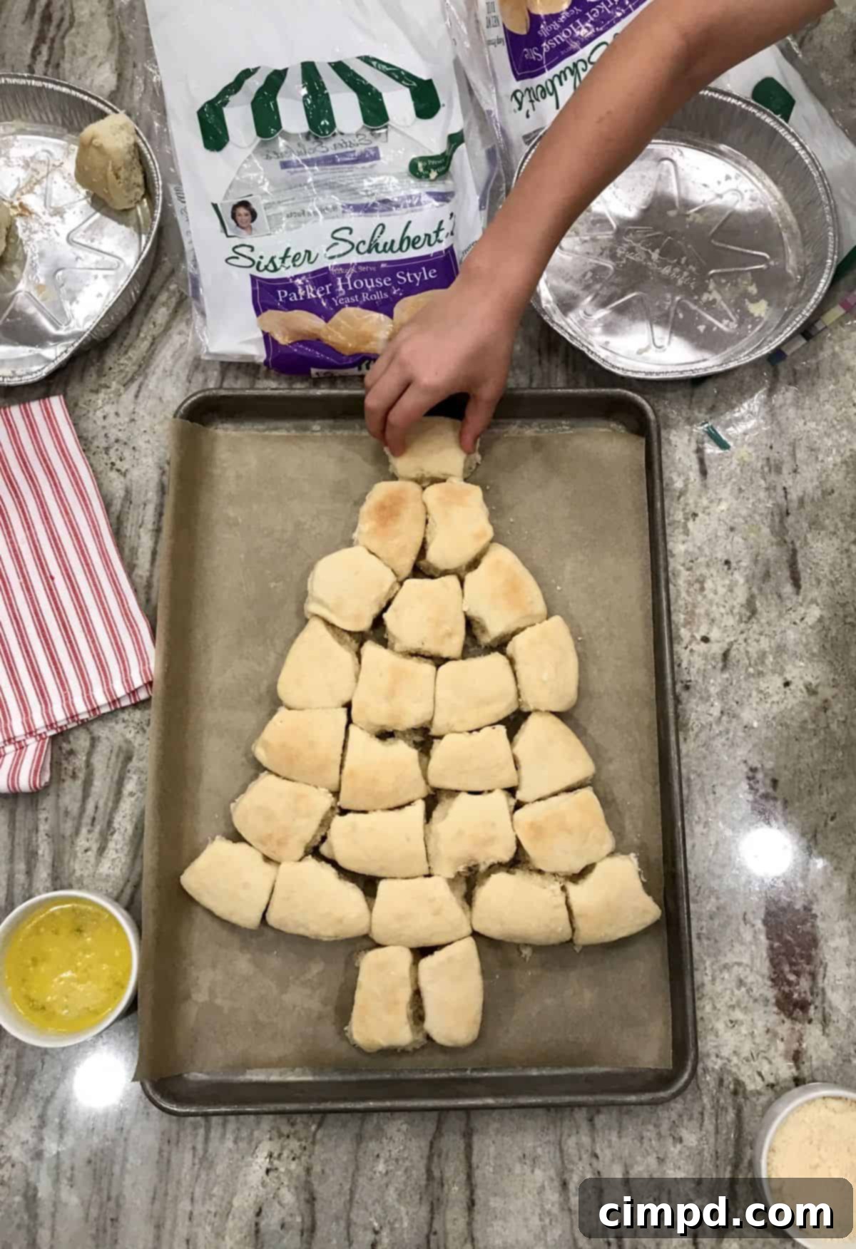 Yuletide Tree Dinner Rolls 5 Christmas Tree Dinner Rolls shaped on a baking sheet, ready for the oven