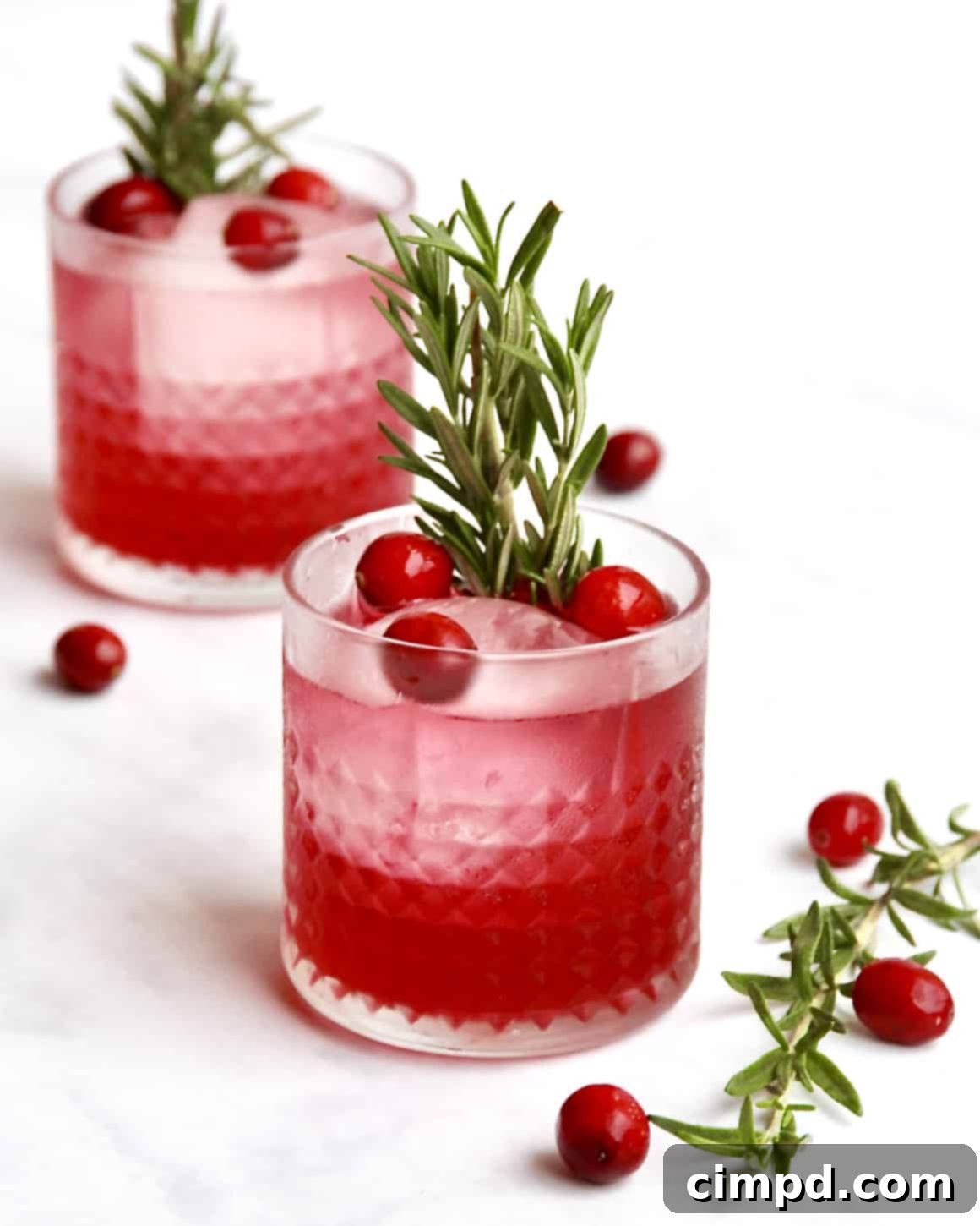 Cranberry Cheer Cocktail by The BakerMama