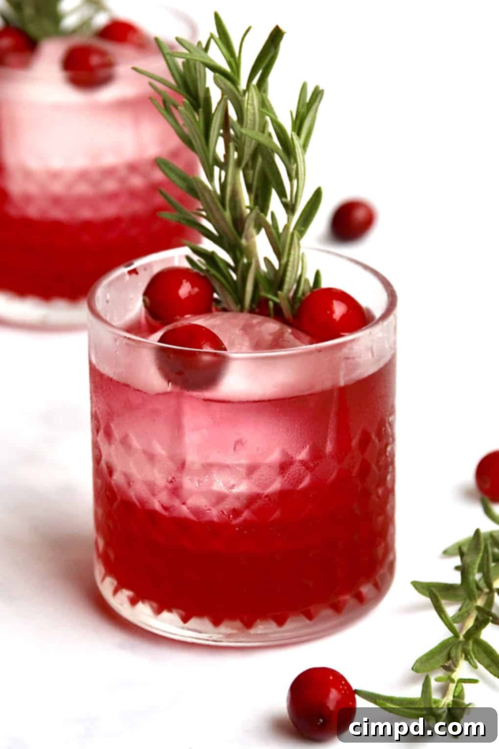 Cranberry Cheer Cocktail by The BakerMama