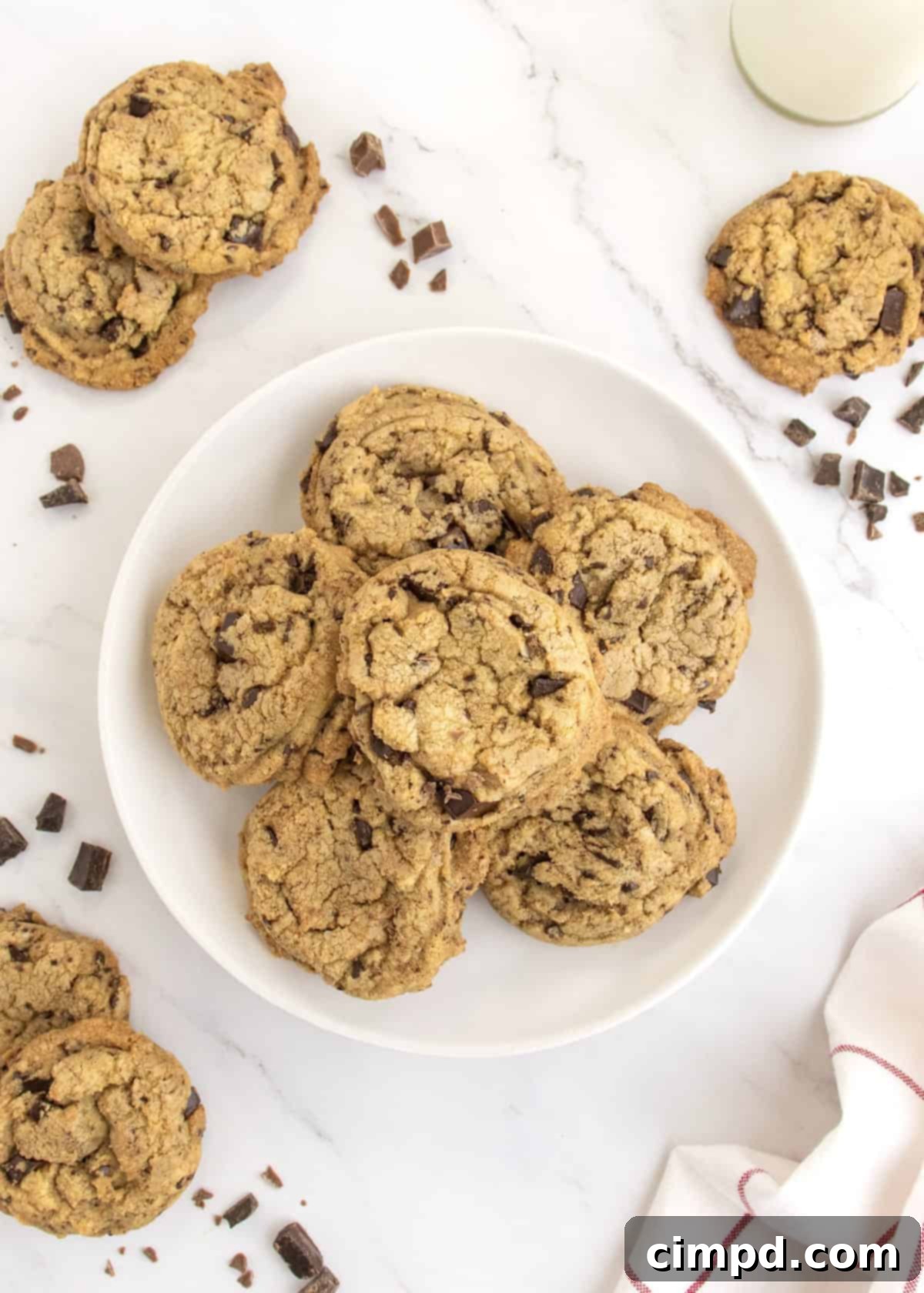 A close-up shot of the interior of a chocolate chip cookie, revealing soft chewiness and abundant melted chocolate.