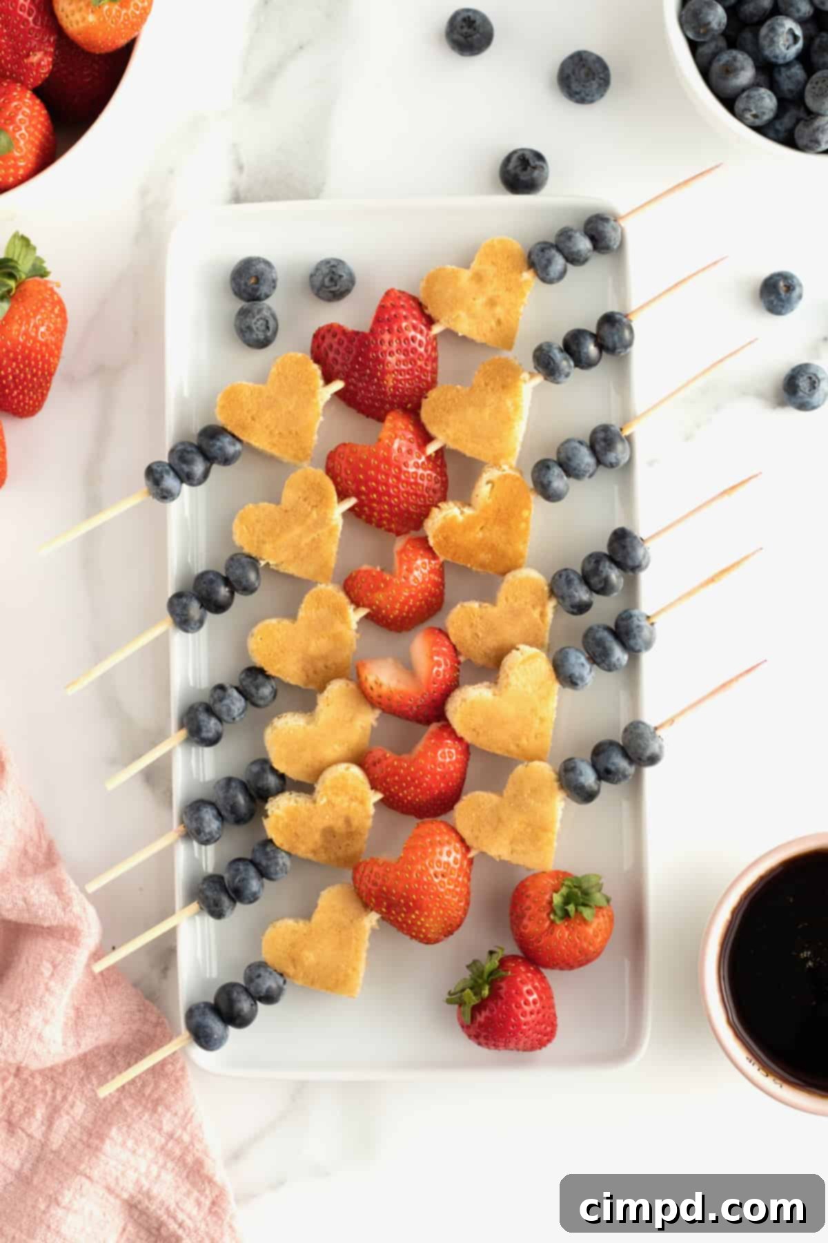 Cupid's Pancake Skewers 2 Adorable heart-shaped pancake kabobs with strawberries and blueberries for Valentine's Day