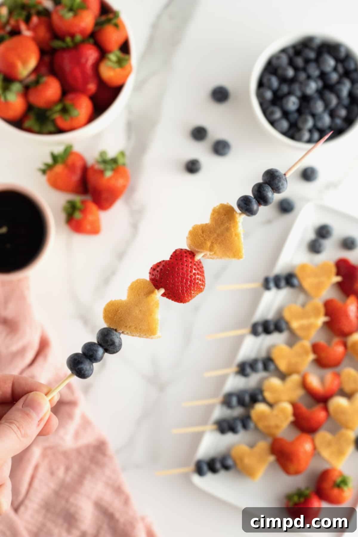 Cupid's Pancake Skewers 5 Multiple Cupid's Pancake Kabobs arranged on a white plate