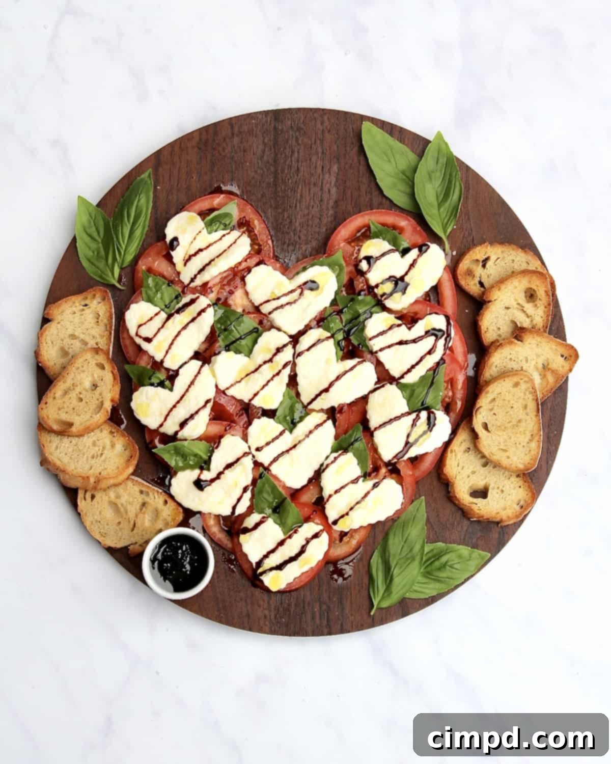 Caprese Hearts 4 Heart Caprese Salad ingredients laid out on a board, ready for assembly.
