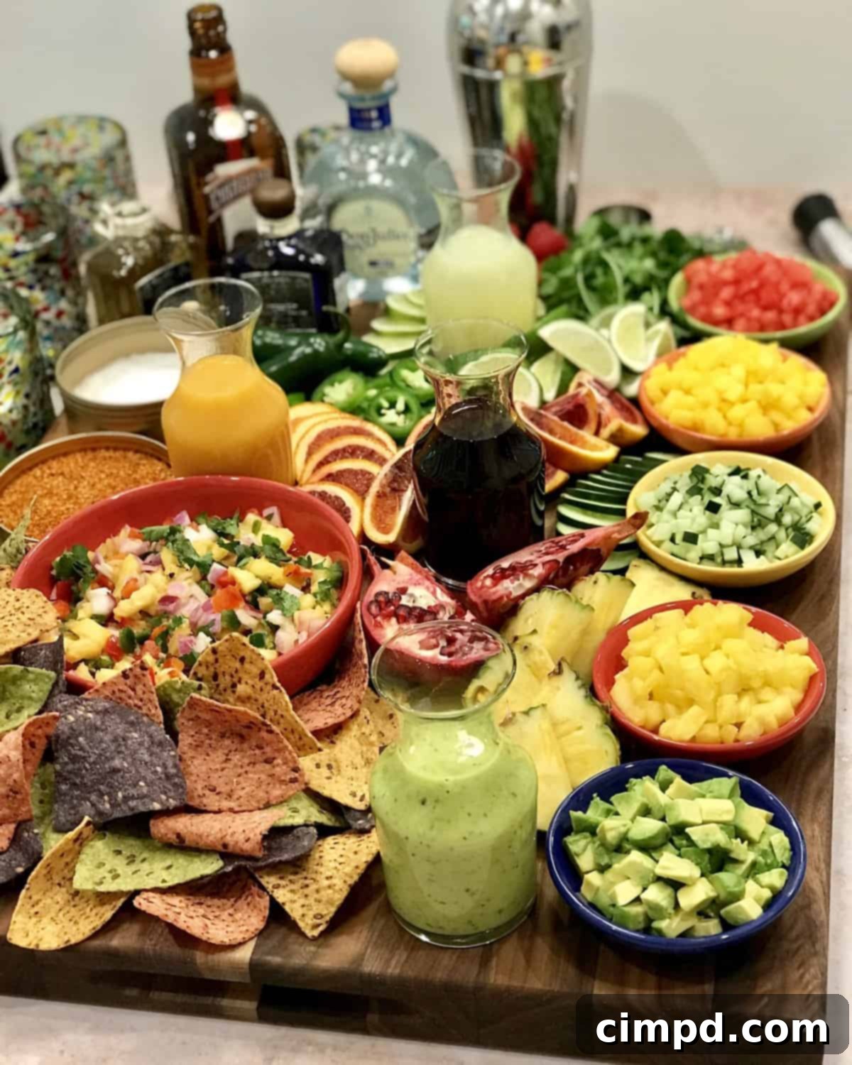 Make-Your-Own Margarita Board with various fruits and tequilas