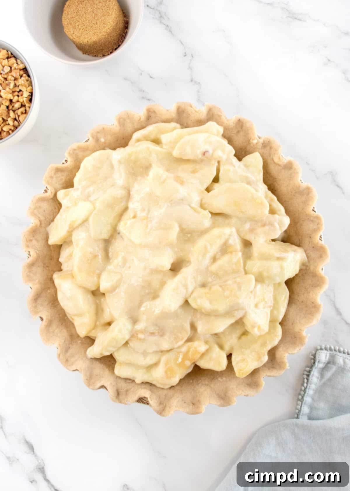 Mom's Signature Apple Pie 7 Close-up of the Mom's Special Apple Pie baking in the oven, showing the filling bubbling.