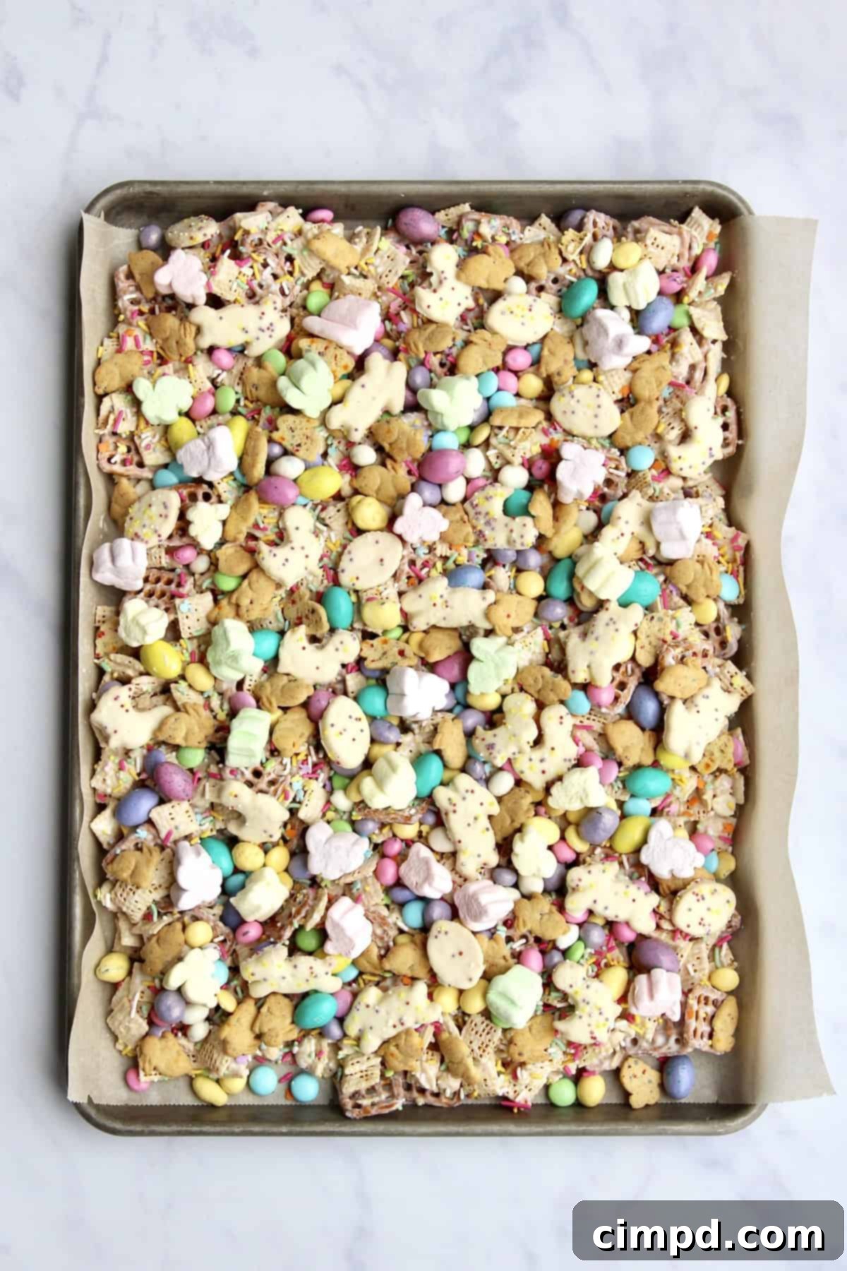 Hoppy Easter Munch 3 Close-up of Easter Snack Mix by The BakerMama, showing the texture and variety of ingredients.