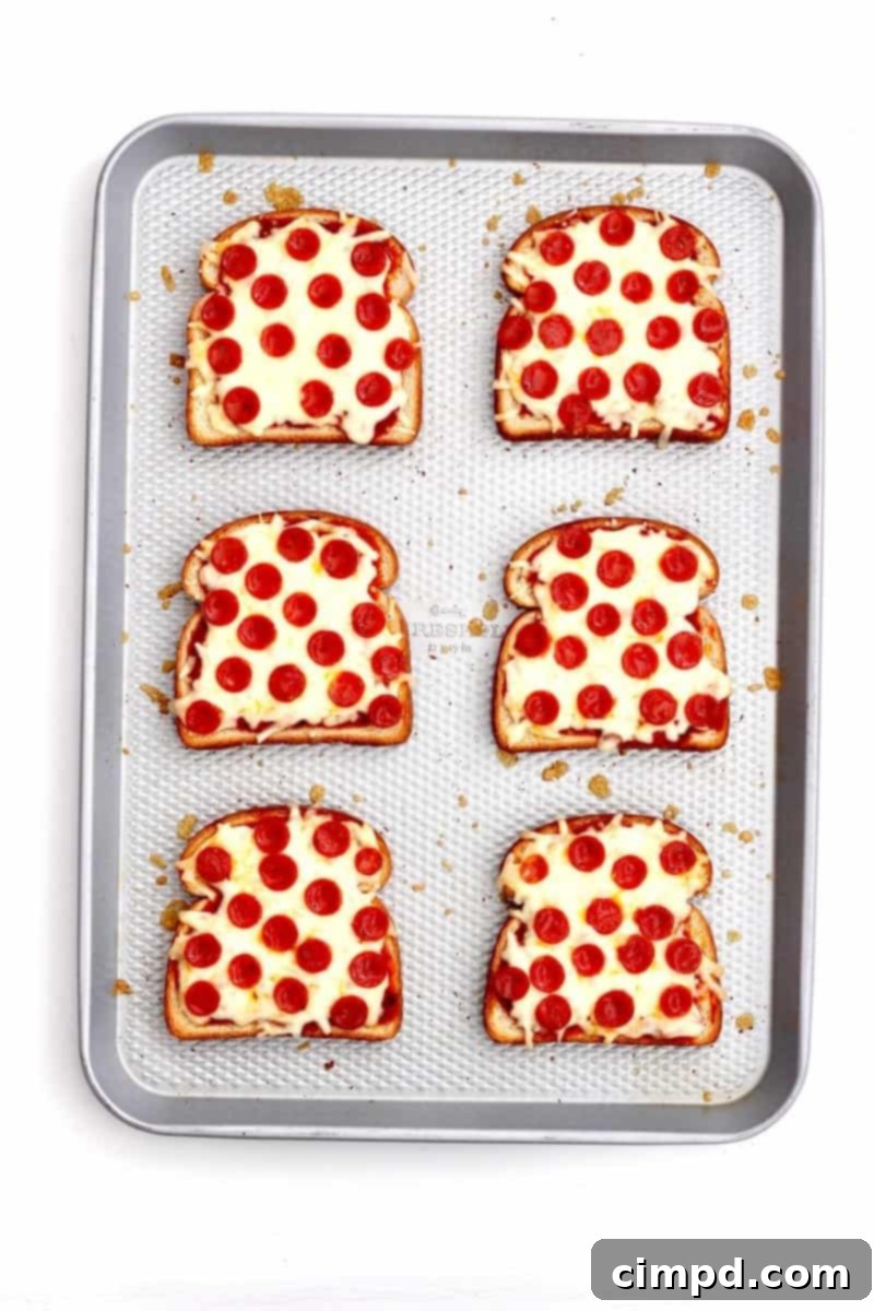Close-up of freshly baked pizza toast with pepperoni and cheese