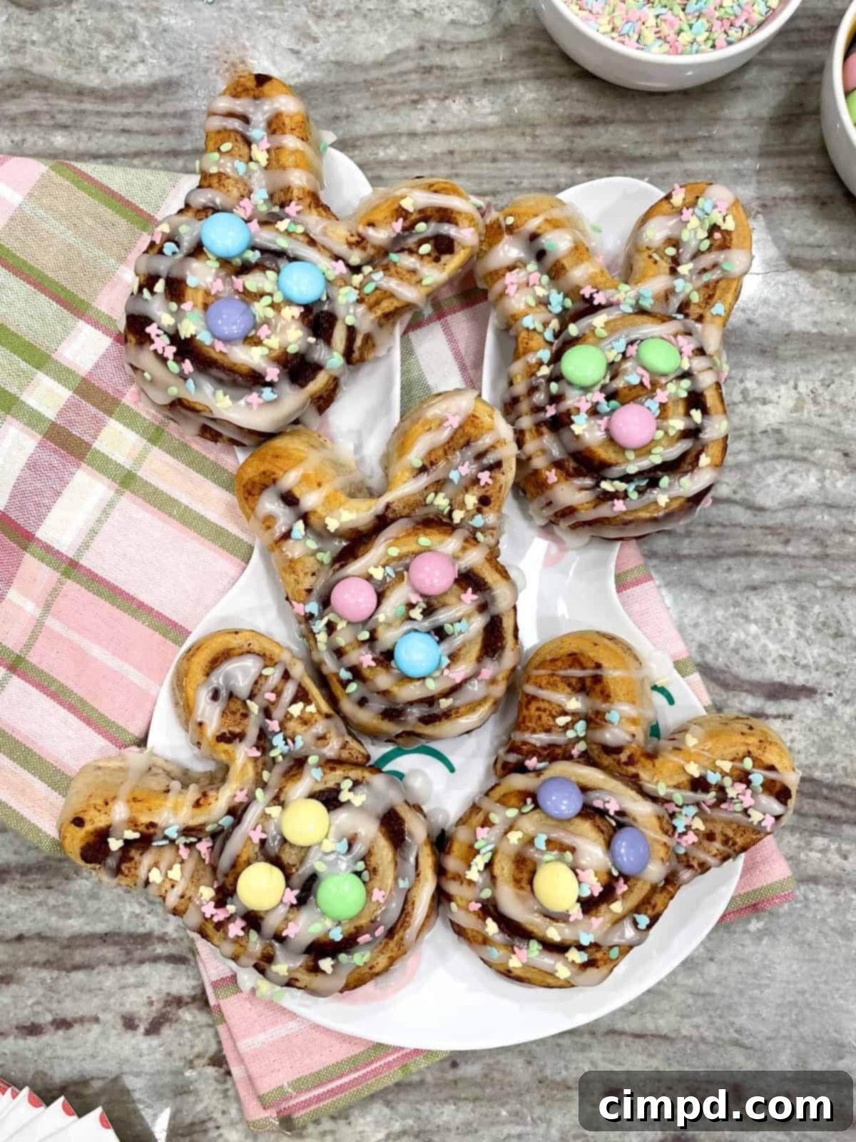 Hoppy Easter Cinnamon Swirls 2 Delightful Easter Bunny Cinnamon Rolls, perfect for a festive breakfast