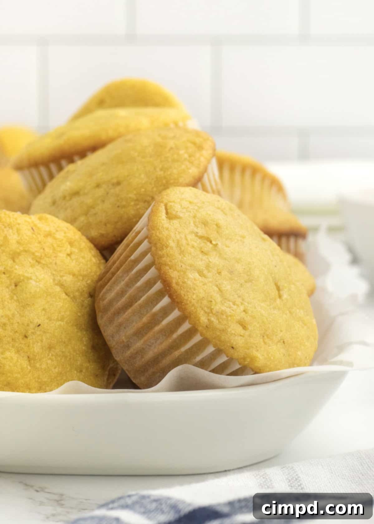 Honey Corn Muffins stored in an airtight container