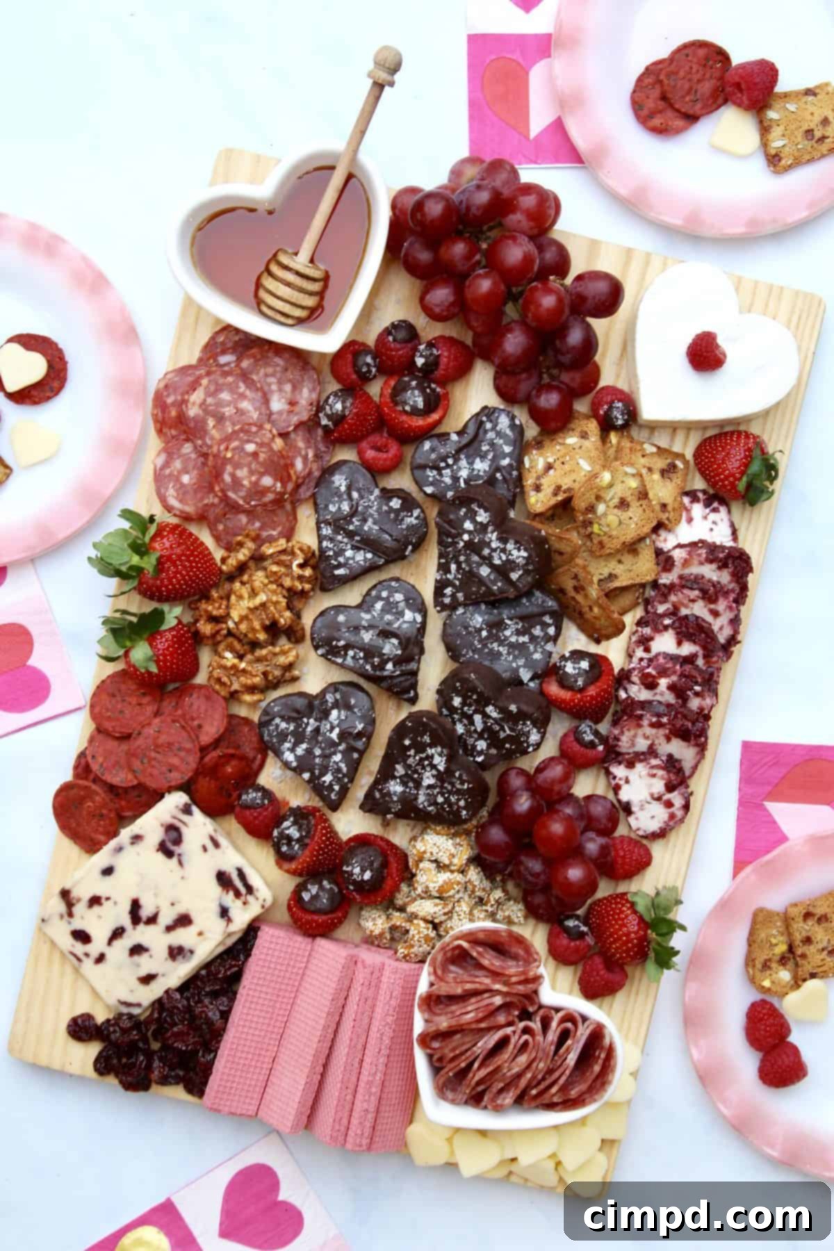 Exquisite Galentine's Day Board featuring Dark Chocolate Fudge and an assortment of cheeses, meats, and fruits, perfect for celebrating friendship.