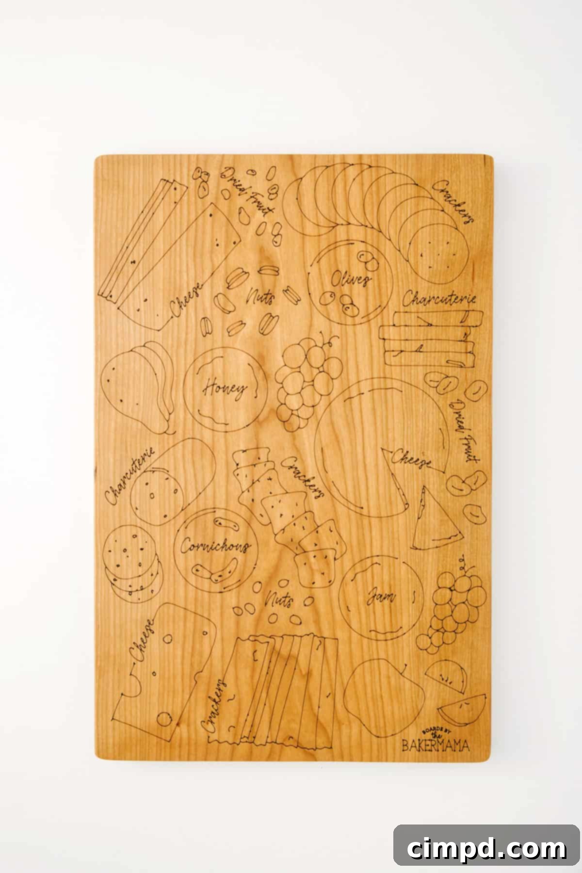 The BakerMama's Signature Board, beautifully arranged with cheeses, meats, fruits, and crackers.