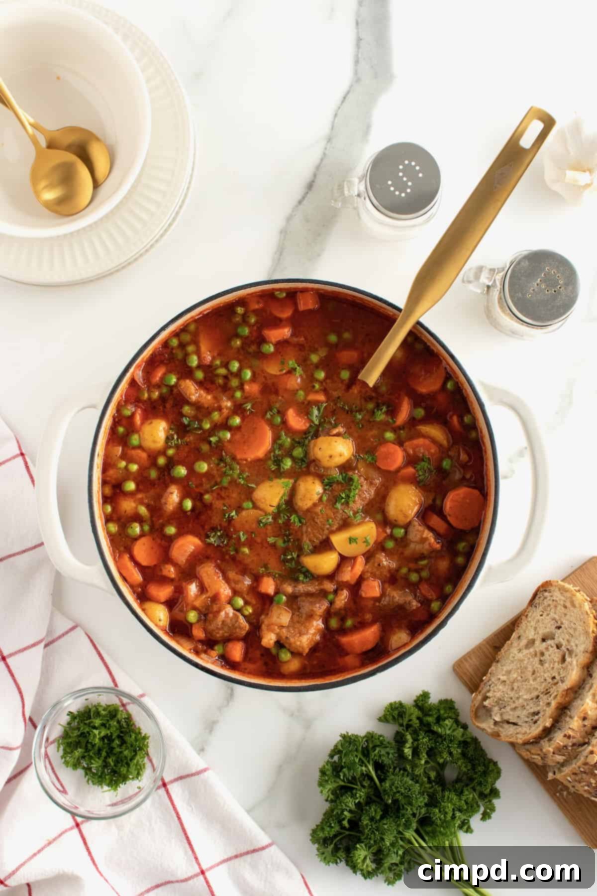 A Dutch oven simmering on the stovetop, perfect for stew.