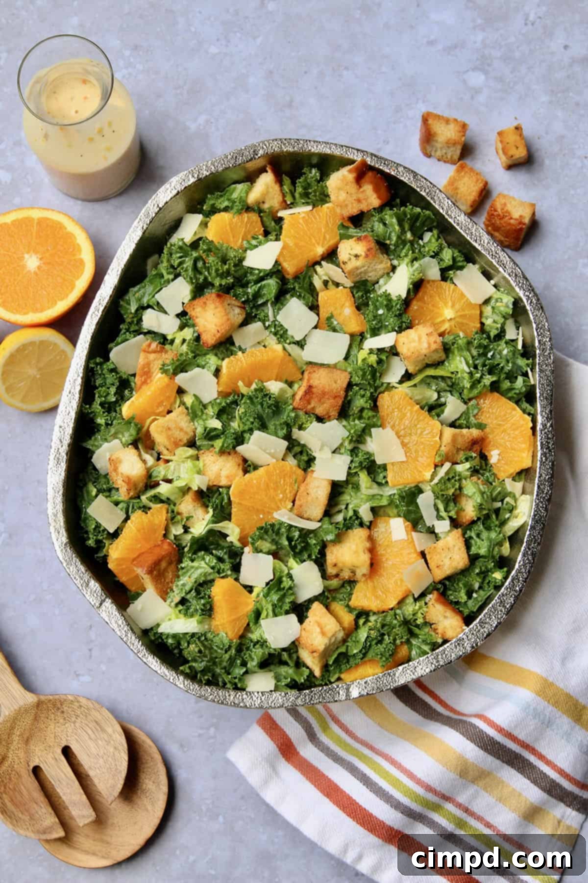 Prepared Citrus Caesar Salad with Baked Croutons, ready to be served.