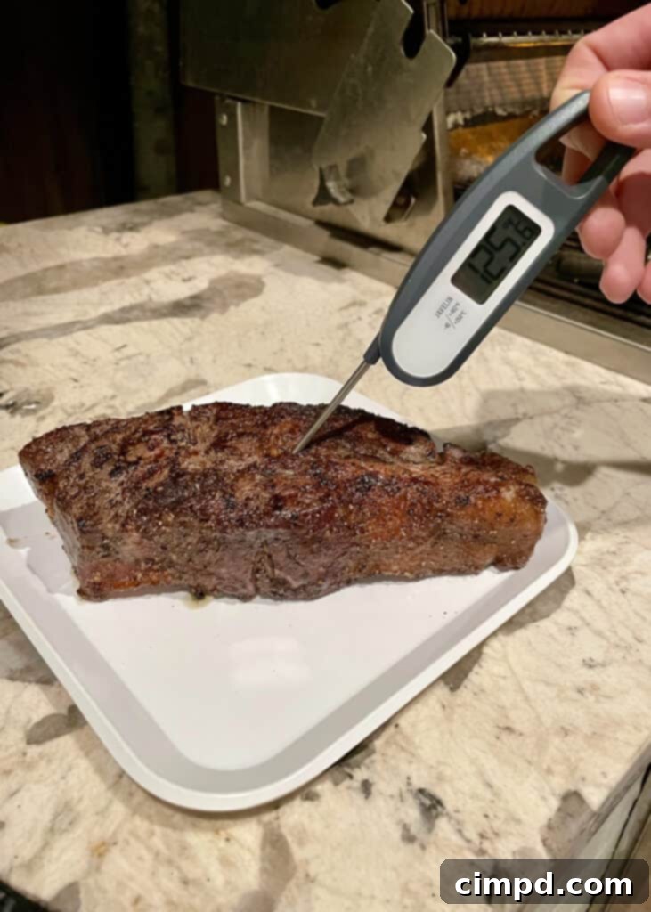 How to Reverse Sear a Steak: perfectly cooked steak with a golden brown crust