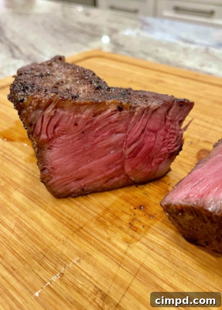 How to Reverse Sear a Steak: plated meal with steak and baked potato