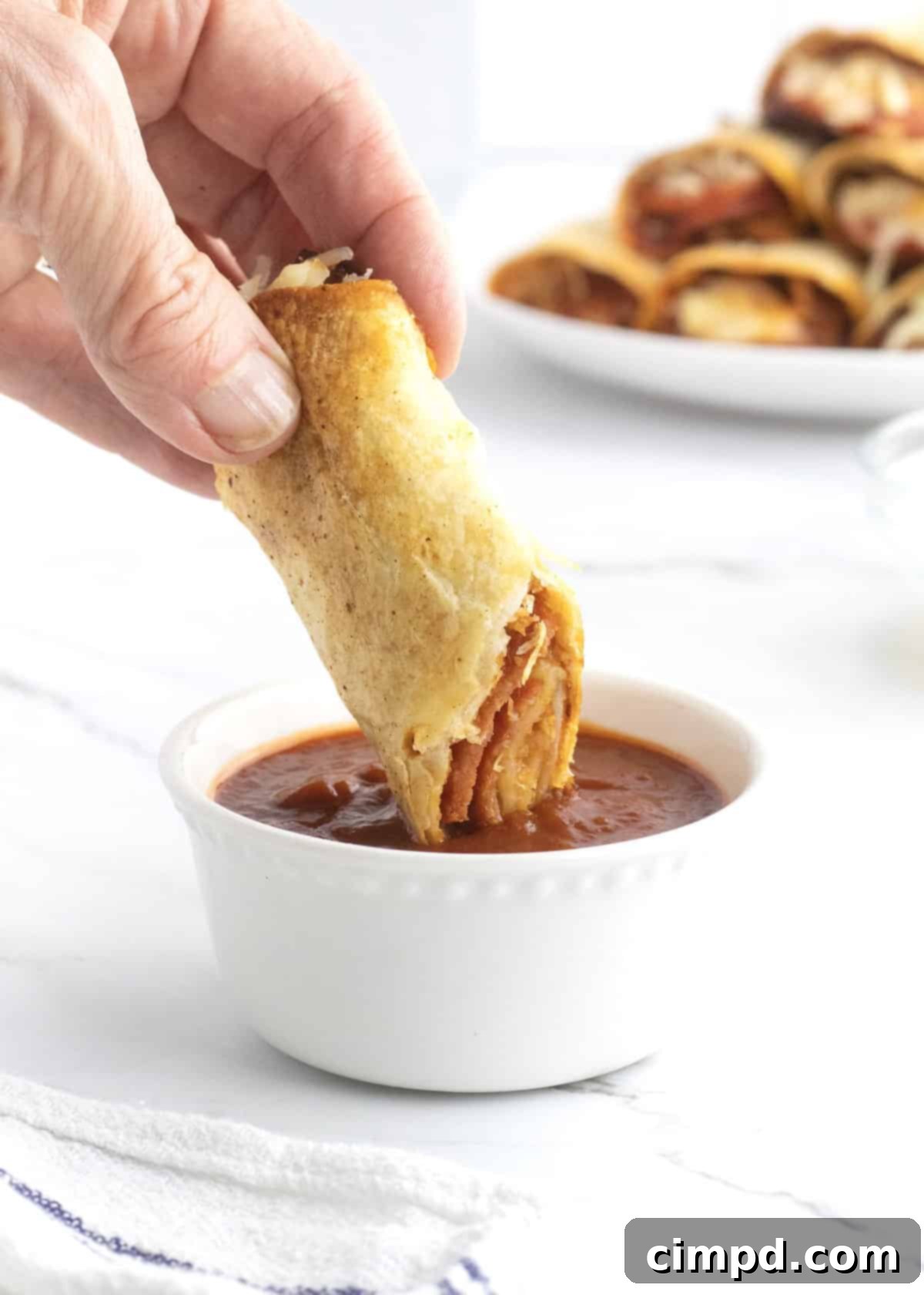 Baked Pizza Taquitos by The BakerMama