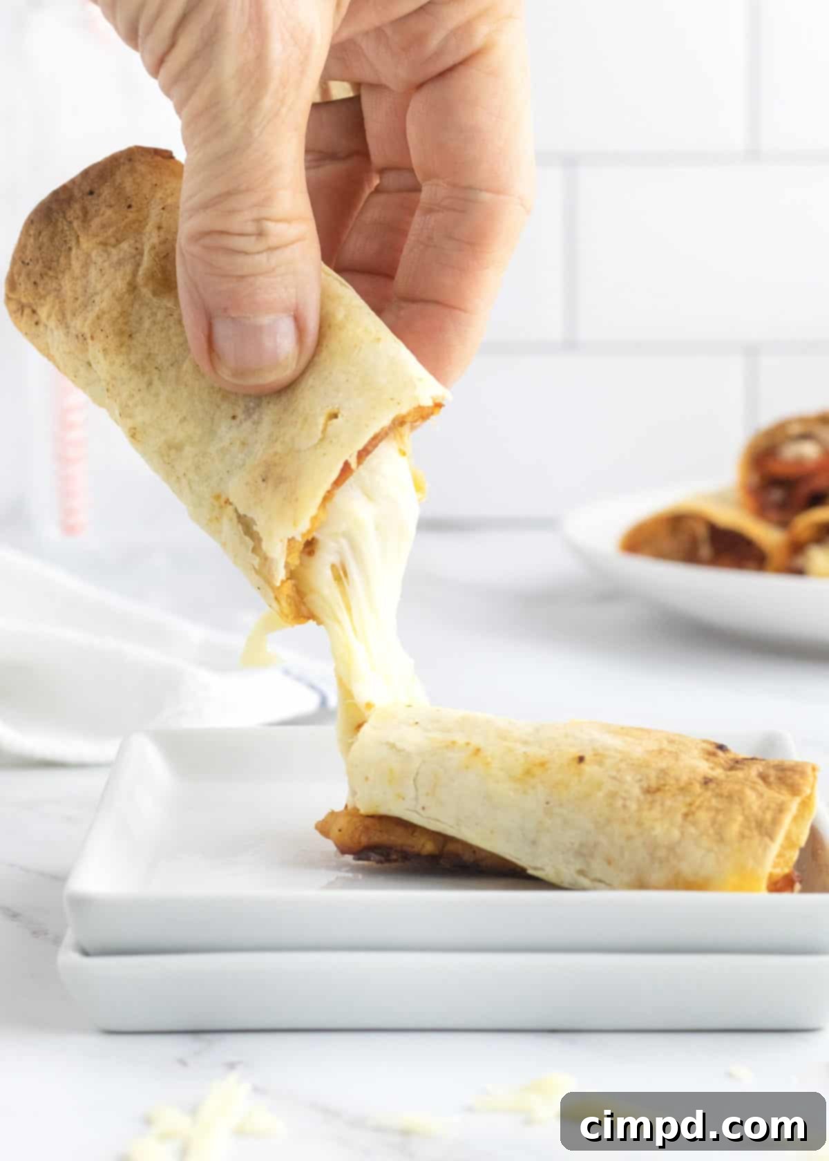 Baked Pizza Taquitos by The BakerMama