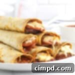 Baked Pizza Taquitos by The BakerMama