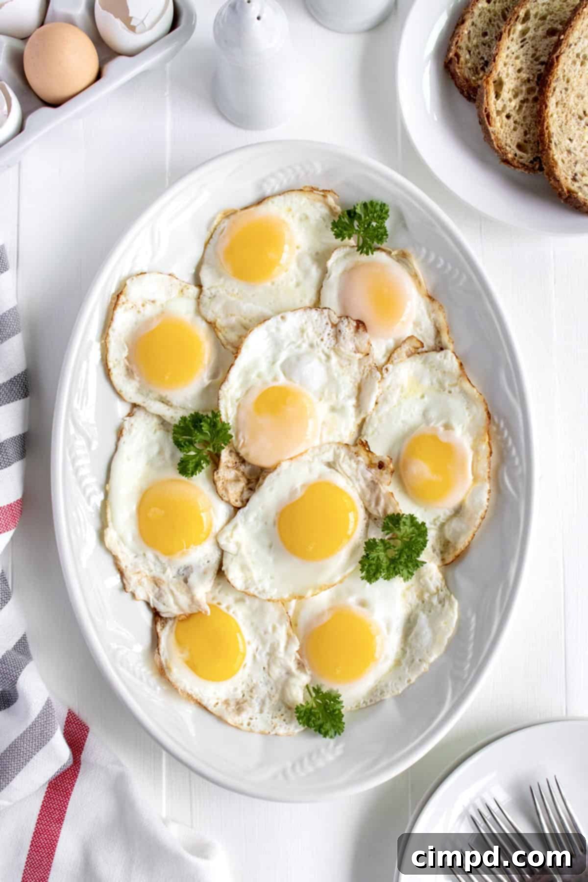 The BakerMama's guide to perfect sunny-side-up eggs, featuring bright yellow yolks