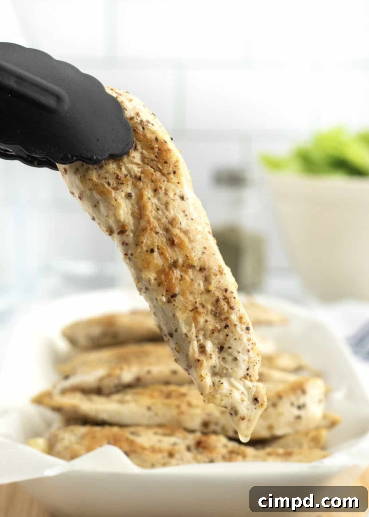 Perfect Pan-Seared Chicken Tenderloins 3 Close-up of Golden-Brown Pan-Seared Chicken Tenderloin by The BakerMama