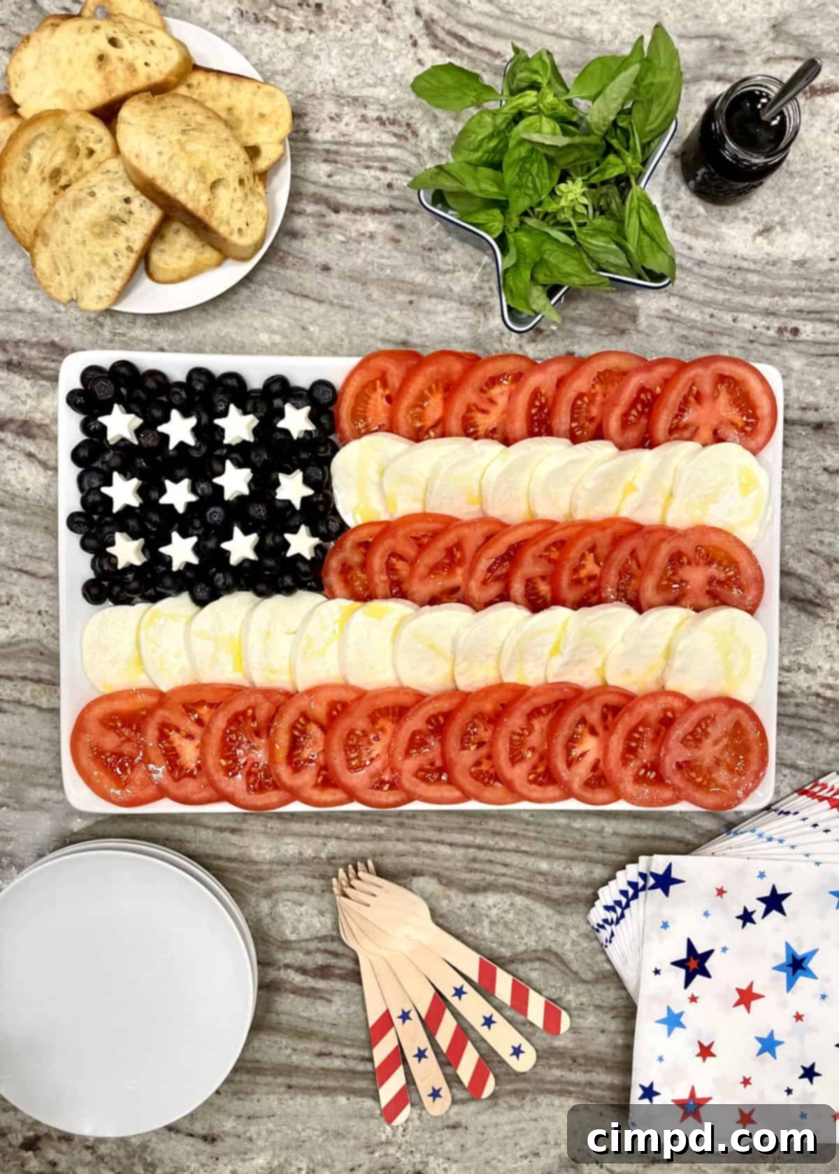 Finished American Flag Caprese Salad, ready to be served at a festive gathering.