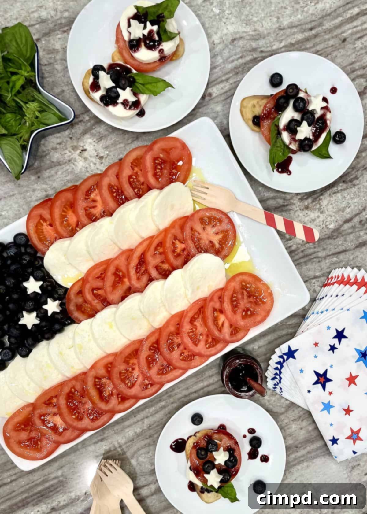 Close-up of the Caprese salad, showing the vibrant colors of tomatoes, mozzarella, and blueberries.