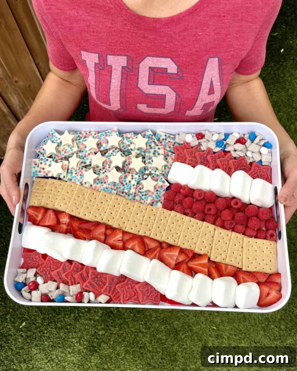 Patriotic Fourth of July S'mores Board 3 Fourth of July S'mores tray with a variety of red, white, and blue treats meticulously arranged to mimic the American Flag.