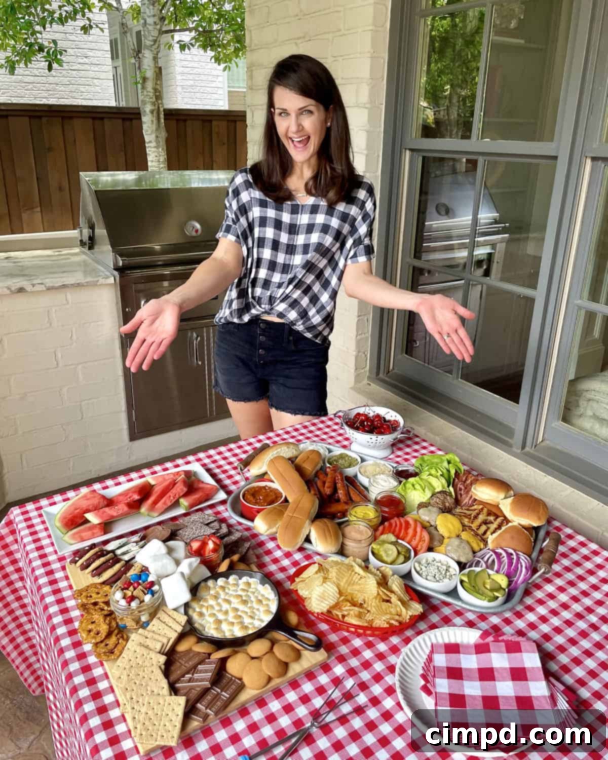 An array of fresh hot dog and burger toppings, including various cheeses, lettuce, tomatoes, pickles, avocados, and grilled pineapple, arranged neatly for a customizable meal.