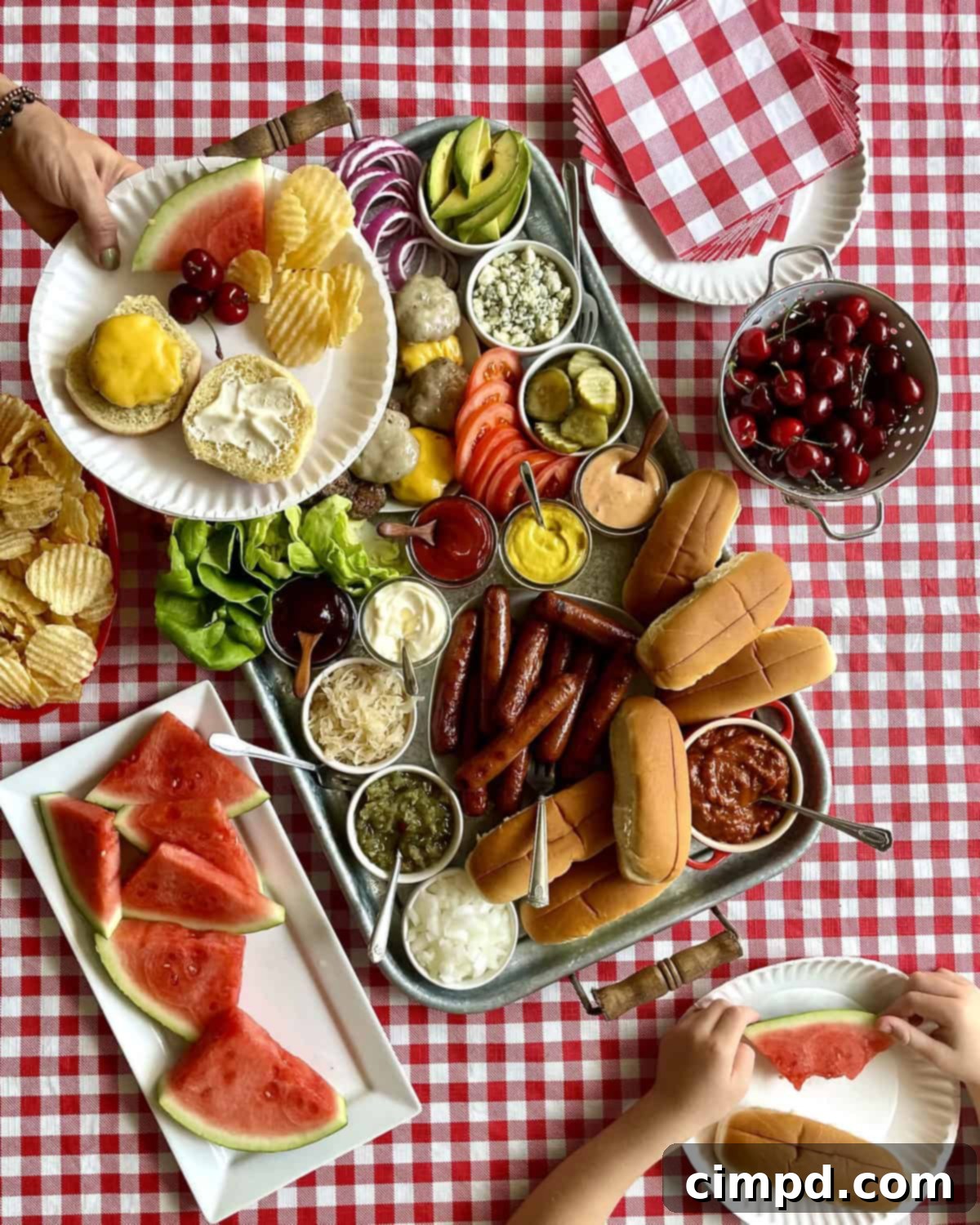 Close-up of perfectly grilled hot dogs with char marks, ready to be served and customized with toppings.