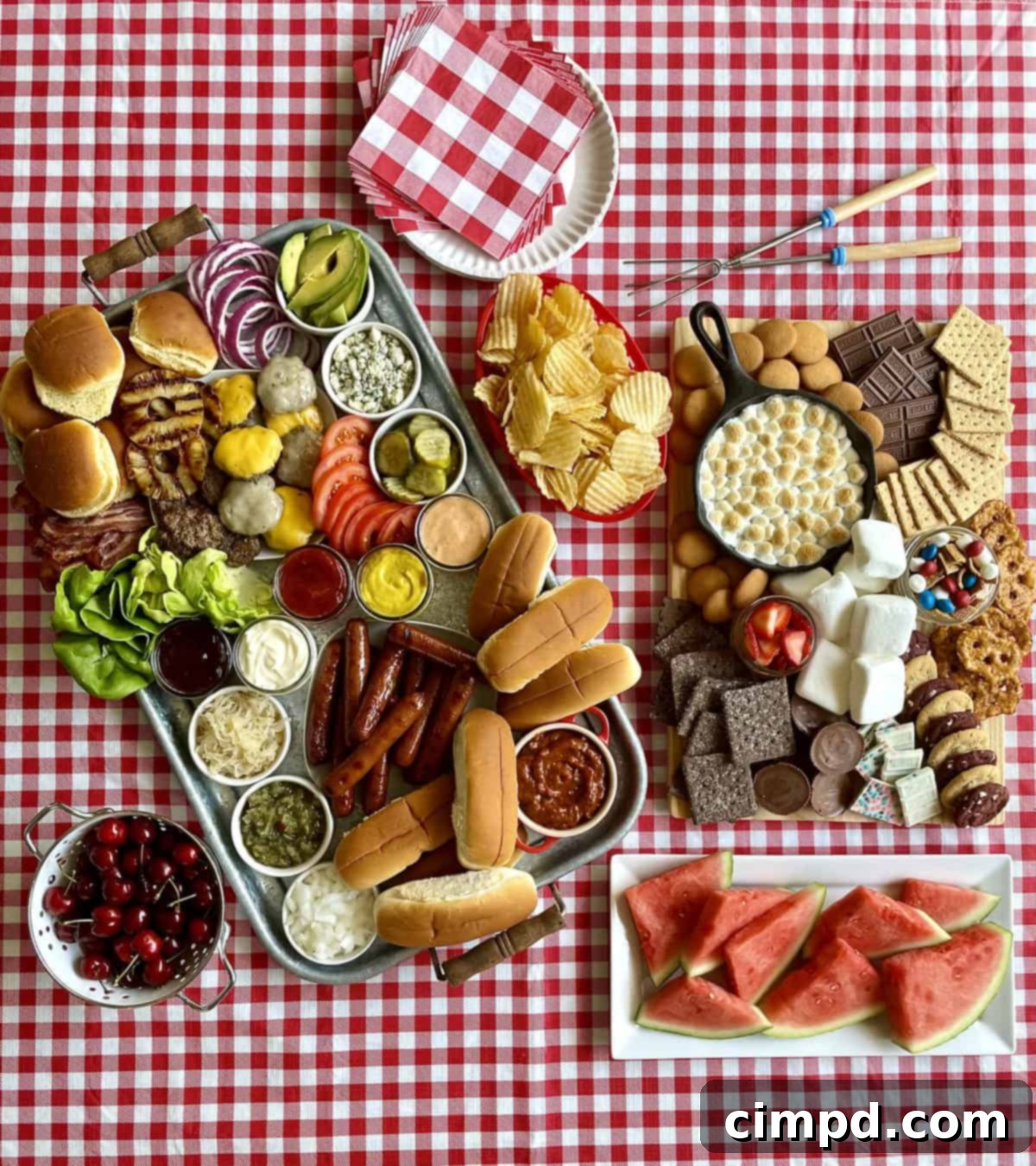 A wide shot of The Ultimate Summer Cookout Spread, showing the entire table laden with food, drinks, and decor for an outdoor party.