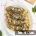 Grilled Corn with Pesto and Parmesan 7 Pesto Parmesan Grilled Corn by The BakerMama