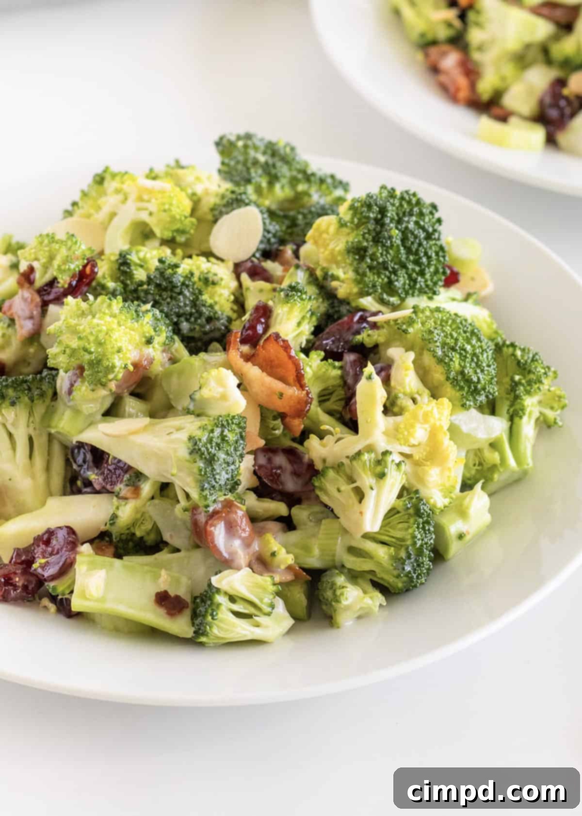 Delicious Creamy Broccoli Salad served in a large bowl, ready to be enjoyed.
