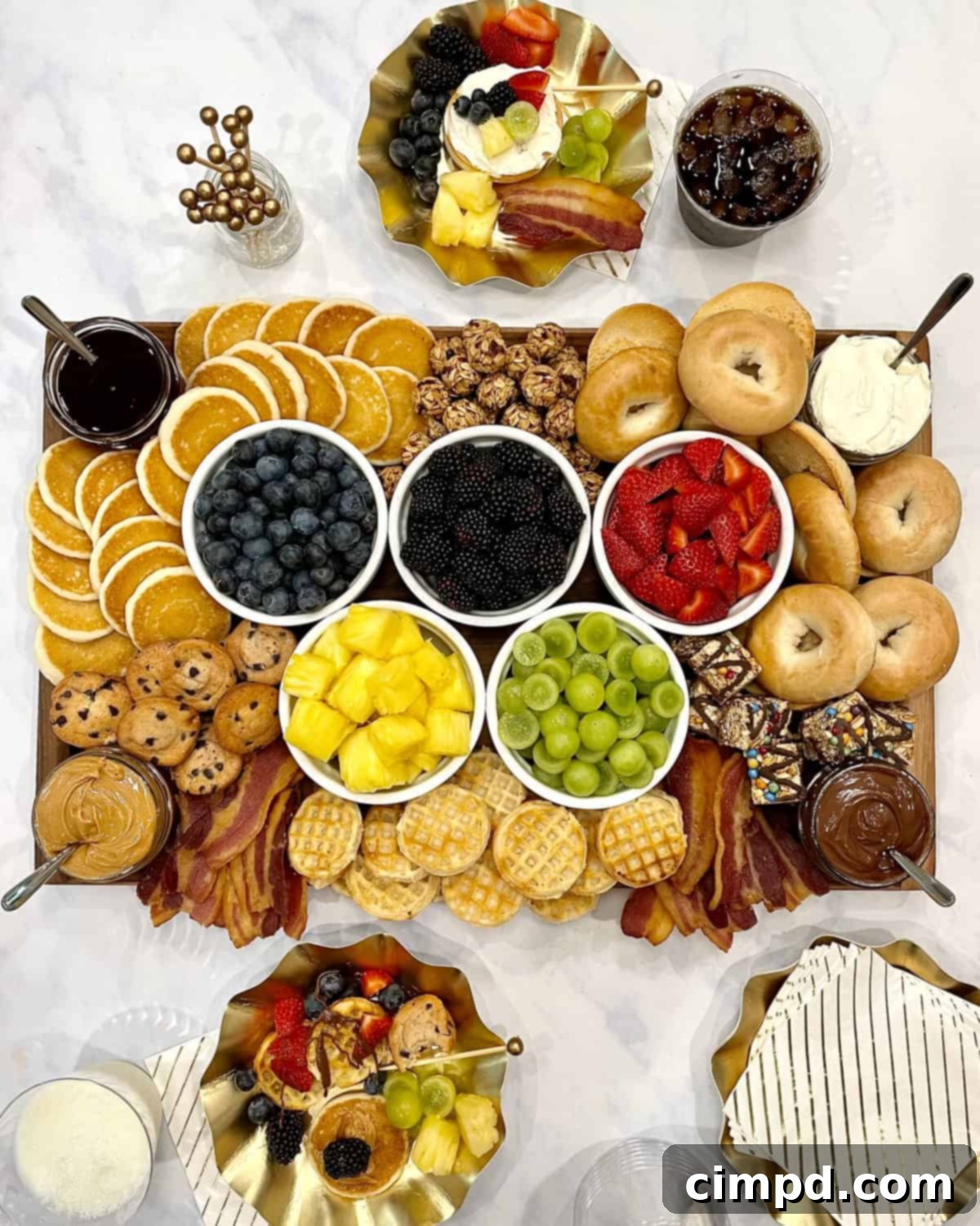 Olympic Morning Fuel 2 Delightful Olympic Breakfast Board featuring fruits, bacon, and pastries