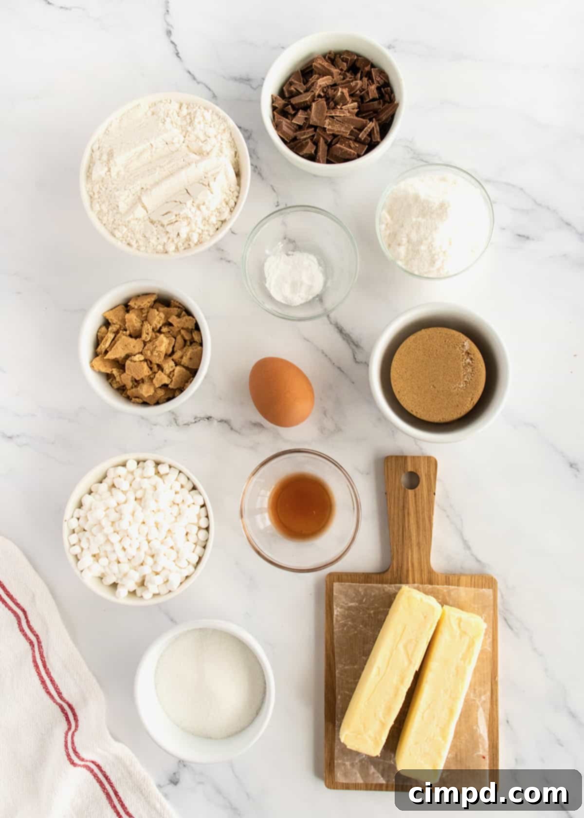 Dreamy Smores Pudding Cookies 4 A stack of warm S'mores Pudding Cookies, ready to be enjoyed, with visible graham cracker crumbs and chocolate chunks.
