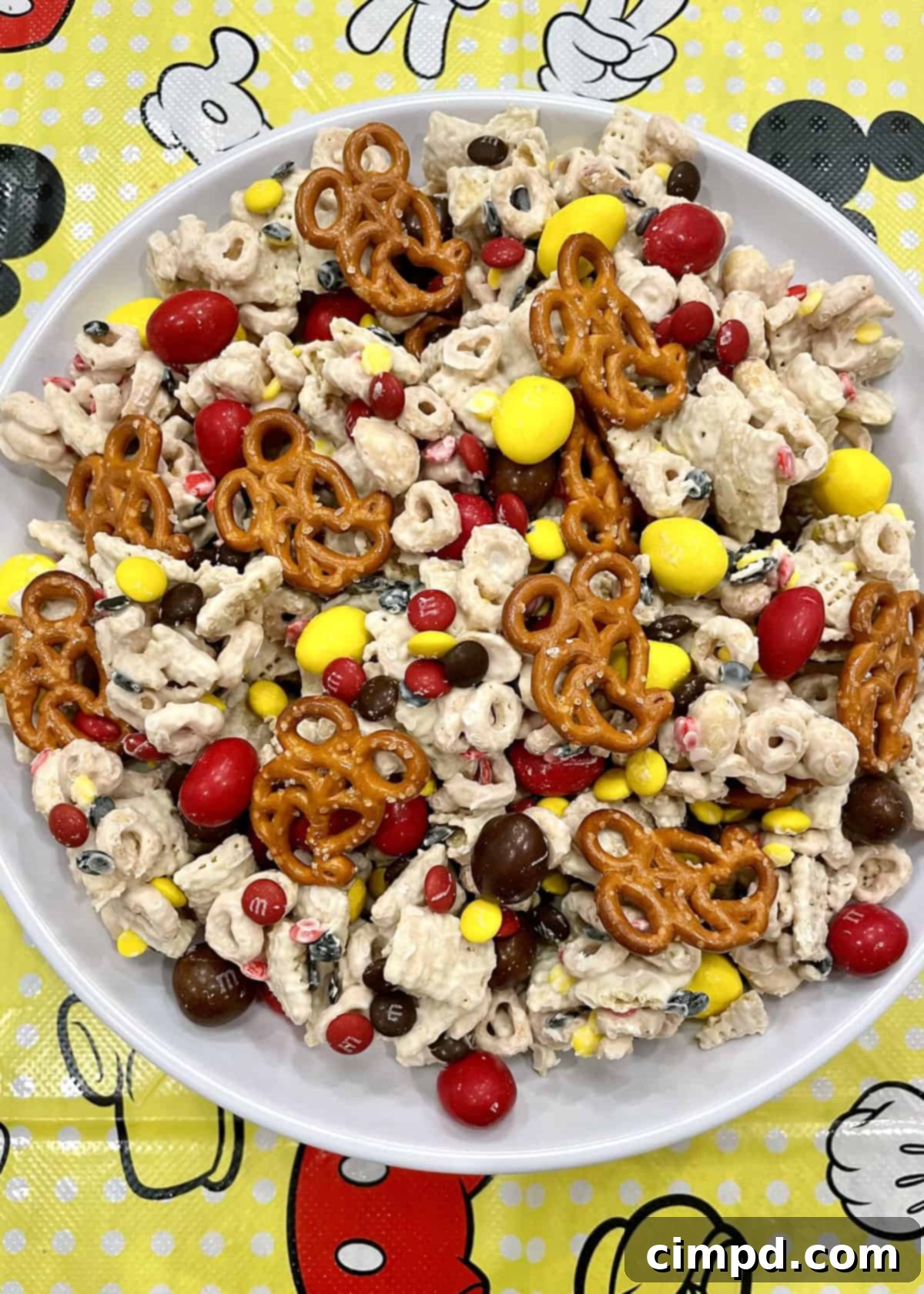 A bowl of Mickey Snack Mix by The BakerMama