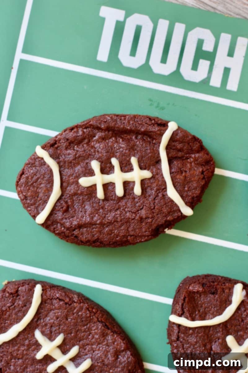 Pigskin Fudge Brownies 5 A platter of Football-Shaped Fudge Brownies decorated with white frosting laces