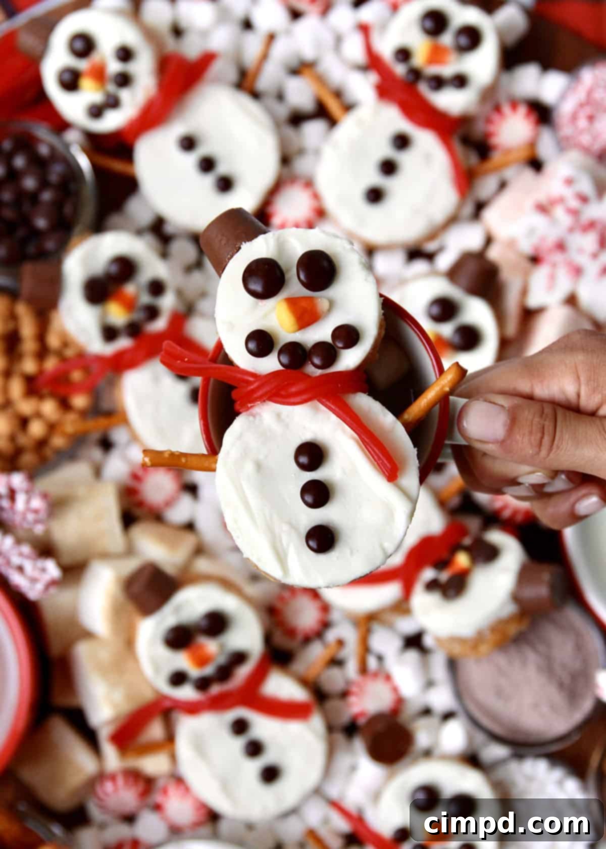 Festive Hot Chocolate Board and Snowman Scotcheroos 8 A wide shot of a beautifully decorated Hot Chocolate Board, laden with a diverse selection of toppings, hot beverages, and Snowman Scotcheroos, ready for a festive gathering.