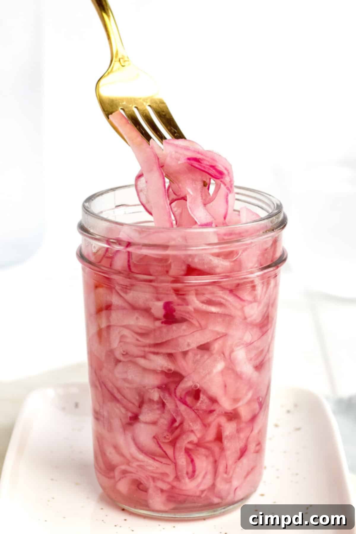 Quick and Easy Pickled Red Onions 3 How to Pickle Red Onion by The BakerMama